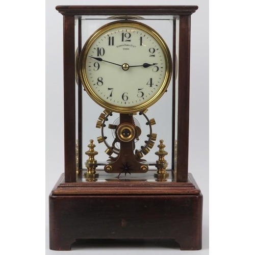 112 - An Edwardian Eureka Clock Company electro magnetic mantel clock, dated 1906. The enamelled dial with... 