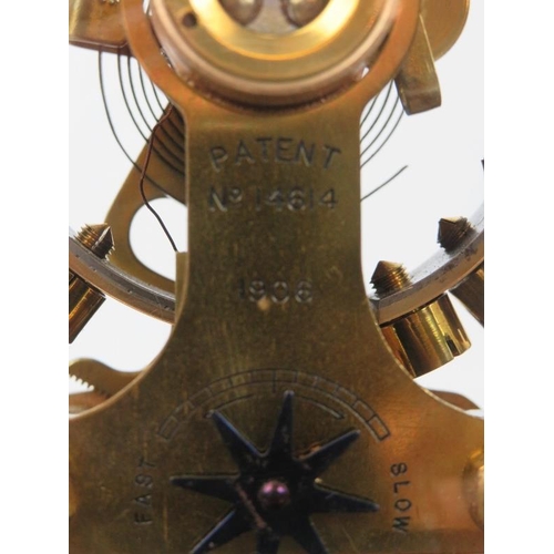 112 - An Edwardian Eureka Clock Company electro magnetic mantel clock, dated 1906. The enamelled dial with... 