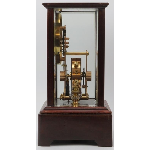 112 - An Edwardian Eureka Clock Company electro magnetic mantel clock, dated 1906. The enamelled dial with... 