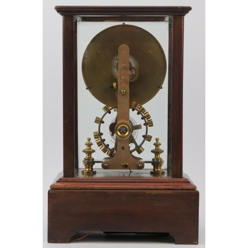 112 - An Edwardian Eureka Clock Company electro magnetic mantel clock, dated 1906. The enamelled dial with... 