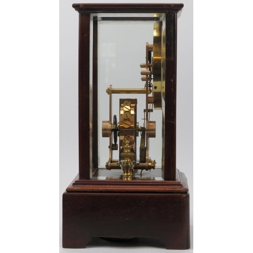 112 - An Edwardian Eureka Clock Company electro magnetic mantel clock, dated 1906. The enamelled dial with... 