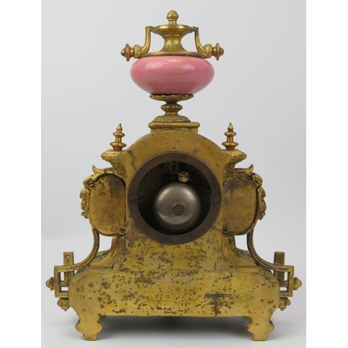 114 - A French ormolu and painted porcelain mantle clock, 19th century. Modelled in the Neoclassical style... 