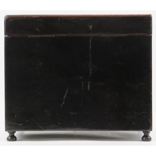 125 - An ebonised wood tantalus drinks decanter box with glassware, 19th century. With brass strung decora... 