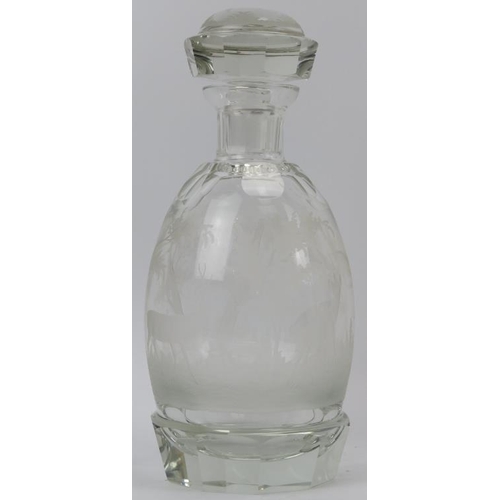 132 - Four clear glass decanters and a cocktail glass. Comprising three cut glass decanters, a decanter en... 