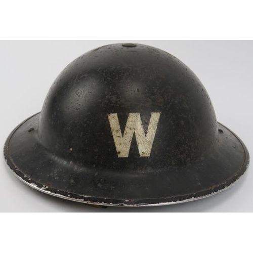 139 - A World War II British civil defence air raid wardens steel brodie helmet. Painted black with a whit... 