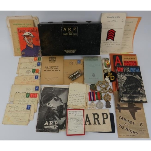 140 - A collection of World War II British Air Raid Precautions civil defence and wartime memorabilia. Not... 