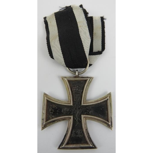 143 - Militaria: A World War I German Imperial iron cross, 2nd class, dated 1914. 
Condition report: Some ... 