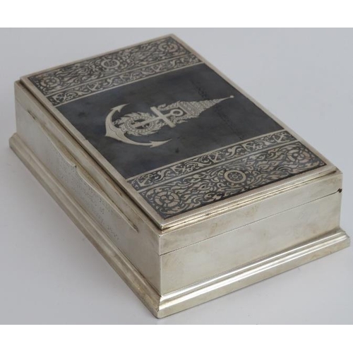 149 - Maritime: A Siam niello decorated silver cigarette box presented to the British Royal Navy’s HMS Ven... 