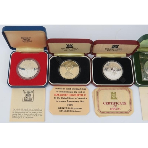 150 - Seven British Royal Mint and Pobjoy Mint silver coins, 20th century. Presentation boxes and paperwor... 