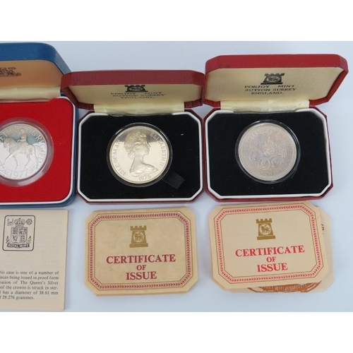 150 - Seven British Royal Mint and Pobjoy Mint silver coins, 20th century. Presentation boxes and paperwor... 