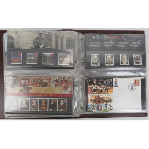 153 - A collection of First Day Cover stamps contained within one large Royal Mail Presentation book, late... 