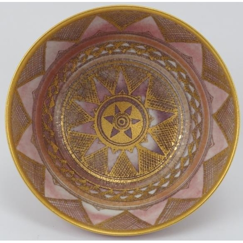 16 - A gilt porcelain studio pottery footed bowl by Mary Rich (born 1940). Decorated with concentric geom... 