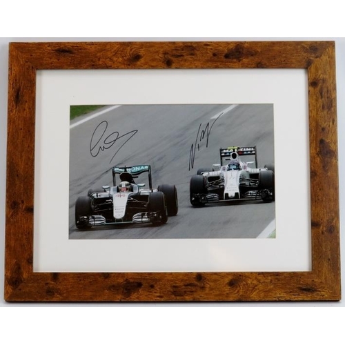 164 - Sporting memorabilia: A Lewis Hamilton & Valtteri Bottas signed Formula 1 photograph, 2016. Depictin... 