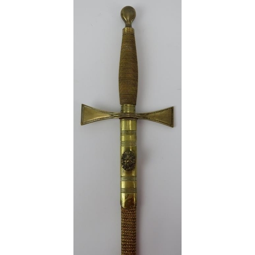 17 - A Masons ceremonial gilt brass and steel bladed dress sword, late 19th/early 20th century. With a wi... 