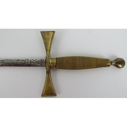 17 - A Masons ceremonial gilt brass and steel bladed dress sword, late 19th/early 20th century. With a wi... 