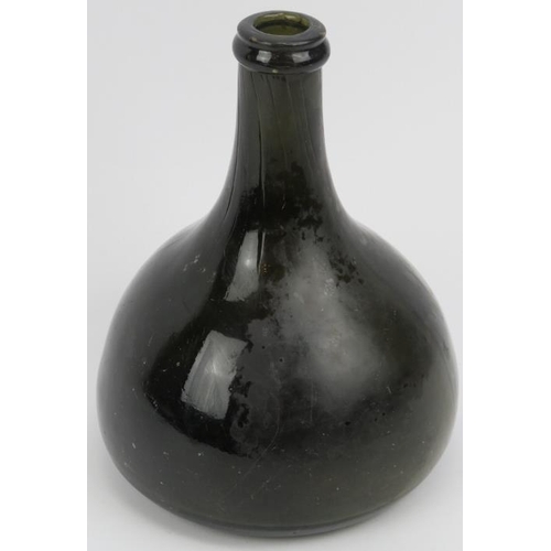 22 - A Georgian dark green glass wine bottle, 18th/19th century. Of onion mallet form with a moulded J&B ... 