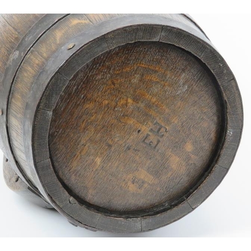 25 - A coopered oak brandy barrel, 19th century. Punched initials EH to both ends. 26.2 cm width. 
Condit... 