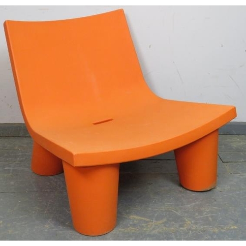 27 - A Slide ‘Low Lita’ orange polyethylene easy chair by the Italian designer Paola Navone, early 21st c... 