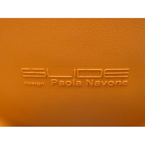 27 - A Slide ‘Low Lita’ orange polyethylene easy chair by the Italian designer Paola Navone, early 21st c... 