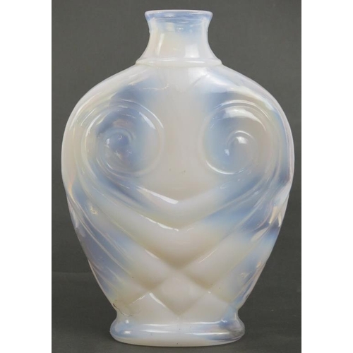 29 - A vintage opaline glass ‘Owl’ vase, circa 1970s. Of compressed ovoid form with stylised features. 17... 