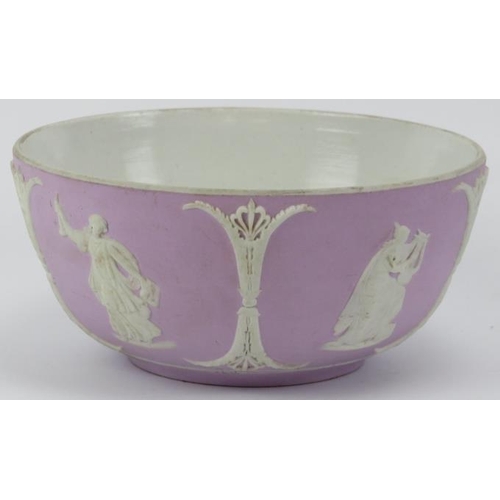 31 - A Victorian Wedgwood neoclassical lilac jasperware bowl. With applied white decoration in relief dep... 