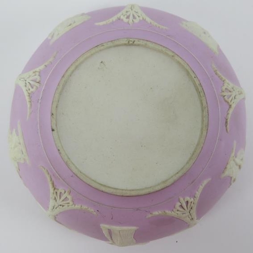 31 - A Victorian Wedgwood neoclassical lilac jasperware bowl. With applied white decoration in relief dep... 