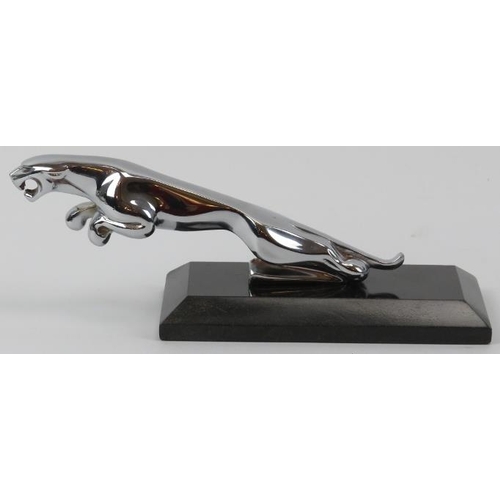 34 - Car Memorabilia: A Jaguar motorcar chrome plated leaping cat car mascot. Mounted on a rectangular ma... 