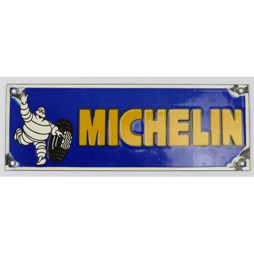 36 - Car Memorabilia: A vintage Michelin enamelled metal advertising sign. 10.8 cm x 30.5 cm. 
Condition ... 