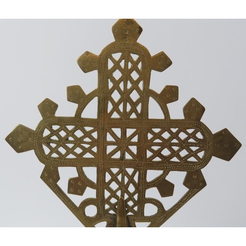 38 - A large Ethiopian Coptic Orthodox Christian processional brass cross, probably 19th century. Support... 