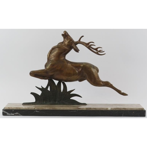 40 - A large French Art Deco bronzed metal sculpture of a leaping stag, early/mid 20th century. Mounted o... 