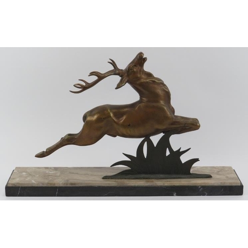 40 - A large French Art Deco bronzed metal sculpture of a leaping stag, early/mid 20th century. Mounted o... 