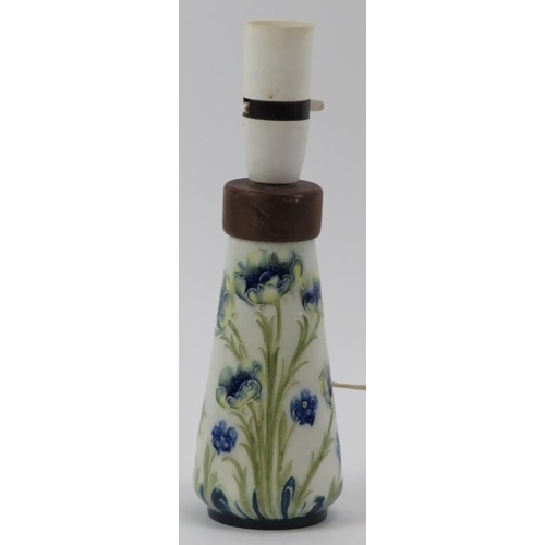 43 - A William Moorcroft James Macintyre & Co Florian Ware blue poppy pattern vase converted into a table... 