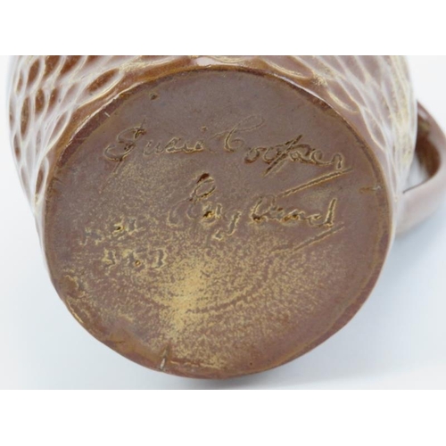 45 - A Susie Cooper brown glazed studio pottery jug, mid 20th century. Incised ’Susie Cooper England’ wit... 