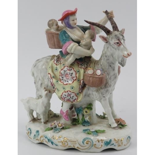 48 - A European porcelain figural group of The Welsh Tailor's Wife riding a goat with her young, late 19t... 