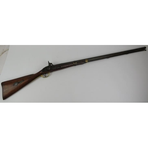 54 - A percussion cap rifle, 19th century. Probably an Enfield rifle. With brass guard and mounts, the ca... 