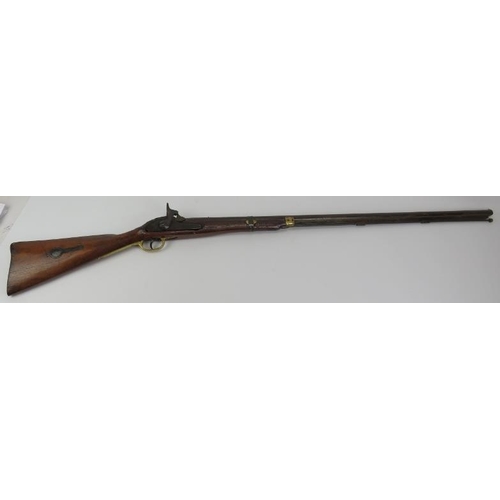 54 - A percussion cap rifle, 19th century. Probably an Enfield rifle. With brass guard and mounts, the ca... 