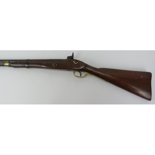 54 - A percussion cap rifle, 19th century. Probably an Enfield rifle. With brass guard and mounts, the ca... 