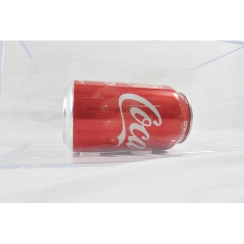 567 - Damien Hirst (British, b.1965) - Signed Coke can, displayed in a perspex case, 20cm long.
Provenance... 