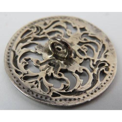 58 - A set of six Victorian silver Green Man decorated buttons. Each with pierced foliate decoration depi... 