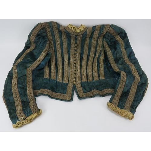 68 - A vintage L&H Nathan Ltd Costumiers of London late 16th century style theatrical teal velvet jacket.... 