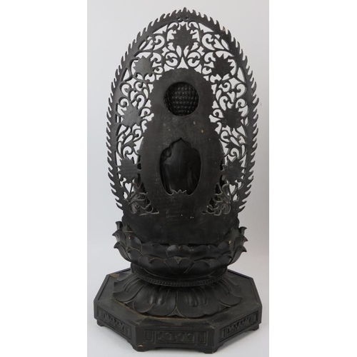 90 - A Chinese carved and ebonised wood Buddhist trinity, 20th century. Each Buddha depicted seated in dh... 