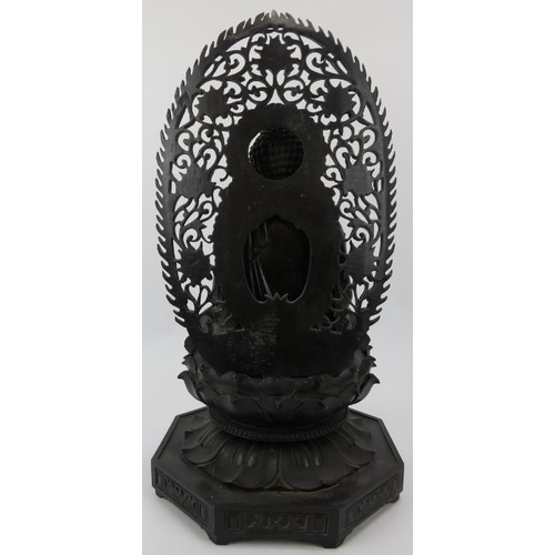 90 - A Chinese carved and ebonised wood Buddhist trinity, 20th century. Each Buddha depicted seated in dh... 