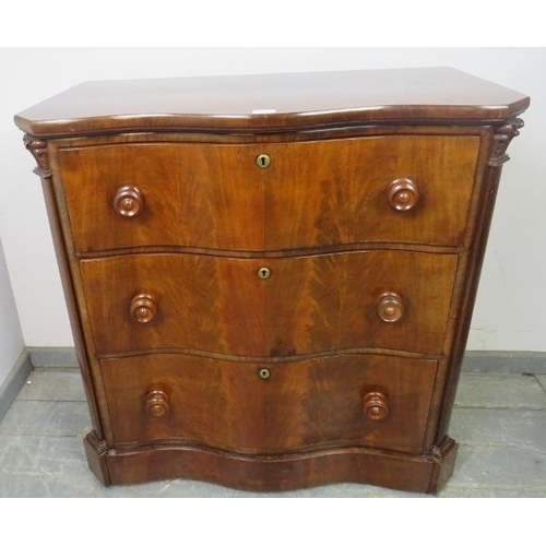 712 - A 19th century serpentine fronted feathered mahogany chest of three long graduated drawers, turned k... 