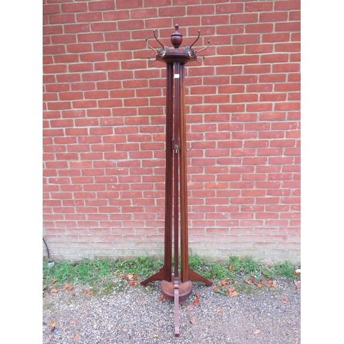 718 - A late 19th century Aesthetic period walnut coat stand, in the manner of James Shoolbred.
H206cm (ap... 