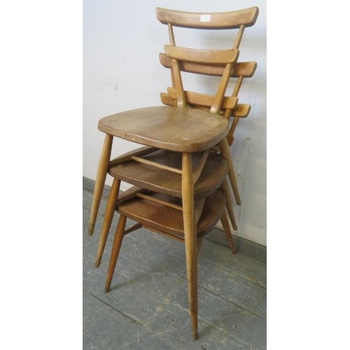 726 - Three mid-century elm and beech ‘green dot’ stacking chairs by Ercol, on canted supports with an ‘H’... 