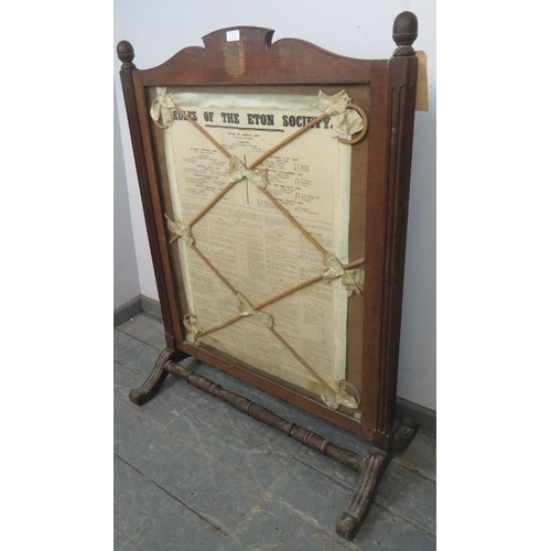 727 - A large antique firescreen featuring ‘The Rules of Eton’ within an oak frame, having reeded uprights... 