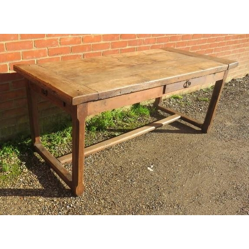 728 - A 19th century rustic French farmhouse kitchen table of good patina, having a side drawer and an end... 