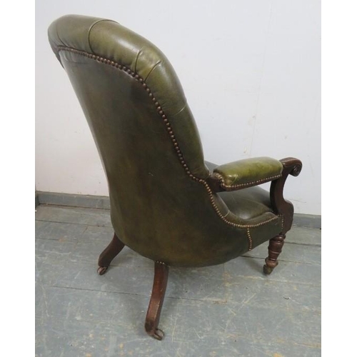 731 - A Victorian open-sided mahogany library chair, upholstered in nicely worn buttoned green leather wit... 