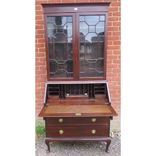 739 - An Edwardian mahogany bureau bookcase, having twin astral glazed doors enclosing adjustable shelves,... 