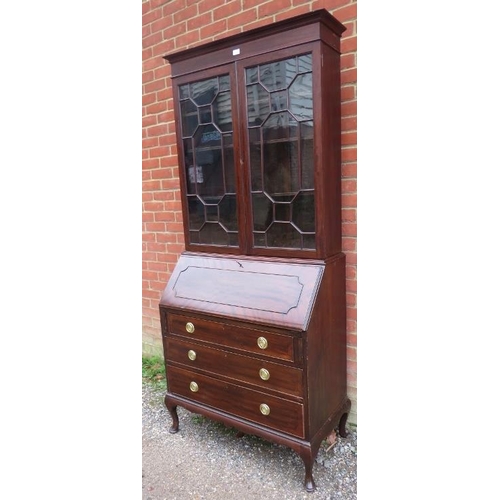 739 - An Edwardian mahogany bureau bookcase, having twin astral glazed doors enclosing adjustable shelves,... 